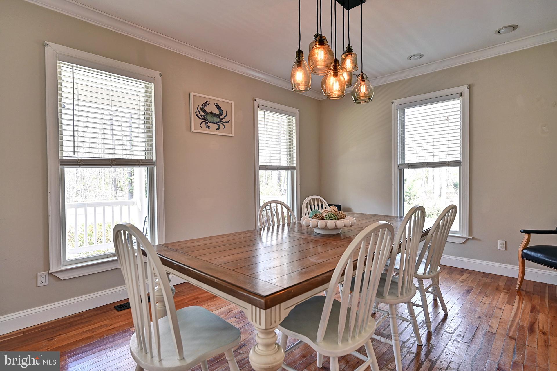 31765 Hickory Manor Road Frankford, DE 19945 - Photo 19 of 53 a view of a dining room with furniture window and wooden floor