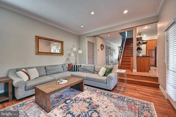 a kitchen with granite countertop stainless steel appliances a refrigerator oven stove a sink and dishwasher