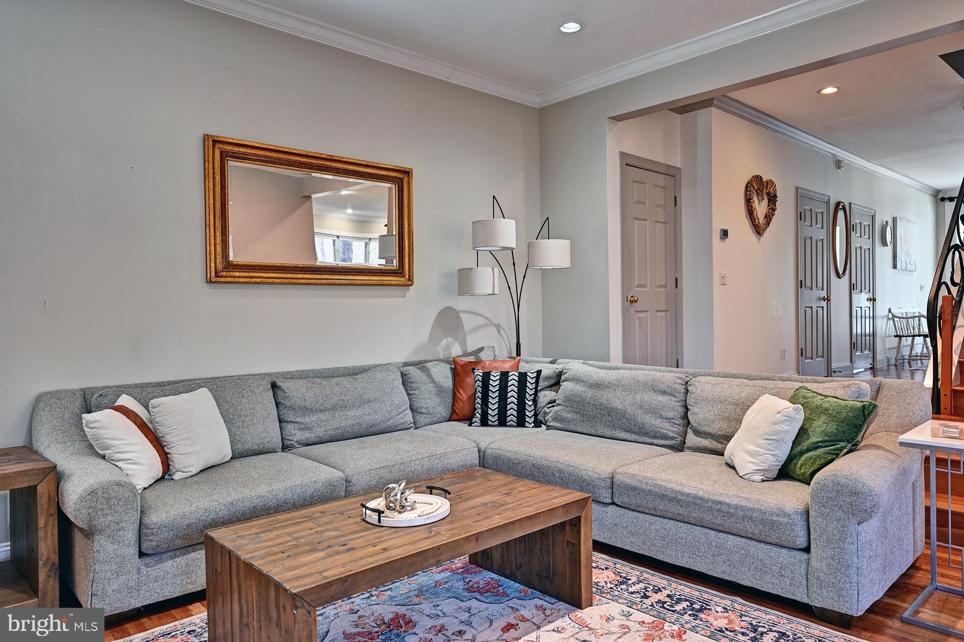 31765 Hickory Manor Road Frankford, DE 19945 - Photo 22 of 53 a living room with furniture a rug and a table