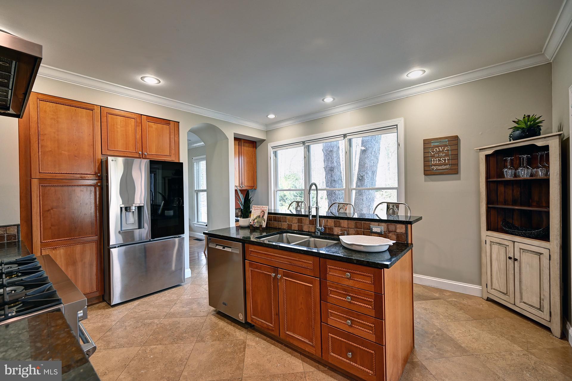 31765 Hickory Manor Road Frankford, DE 19945 - Photo 23 of 53 a kitchen with granite countertop stainless steel appliances a refrigerator oven stove a sink and dishwasher