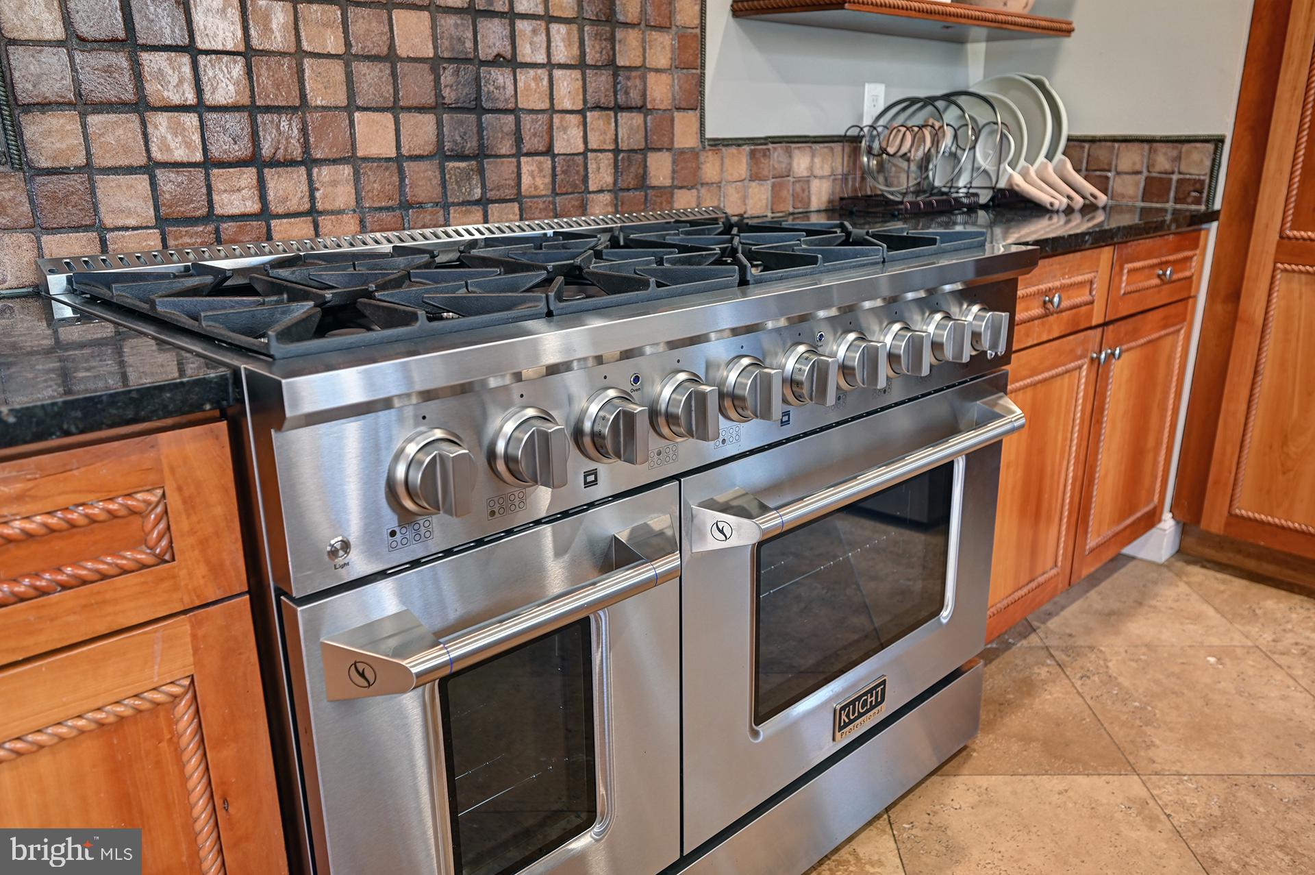 31765 Hickory Manor Road Frankford, DE 19945 - Photo 27 of 53 a stove top oven sitting inside of a kitchen