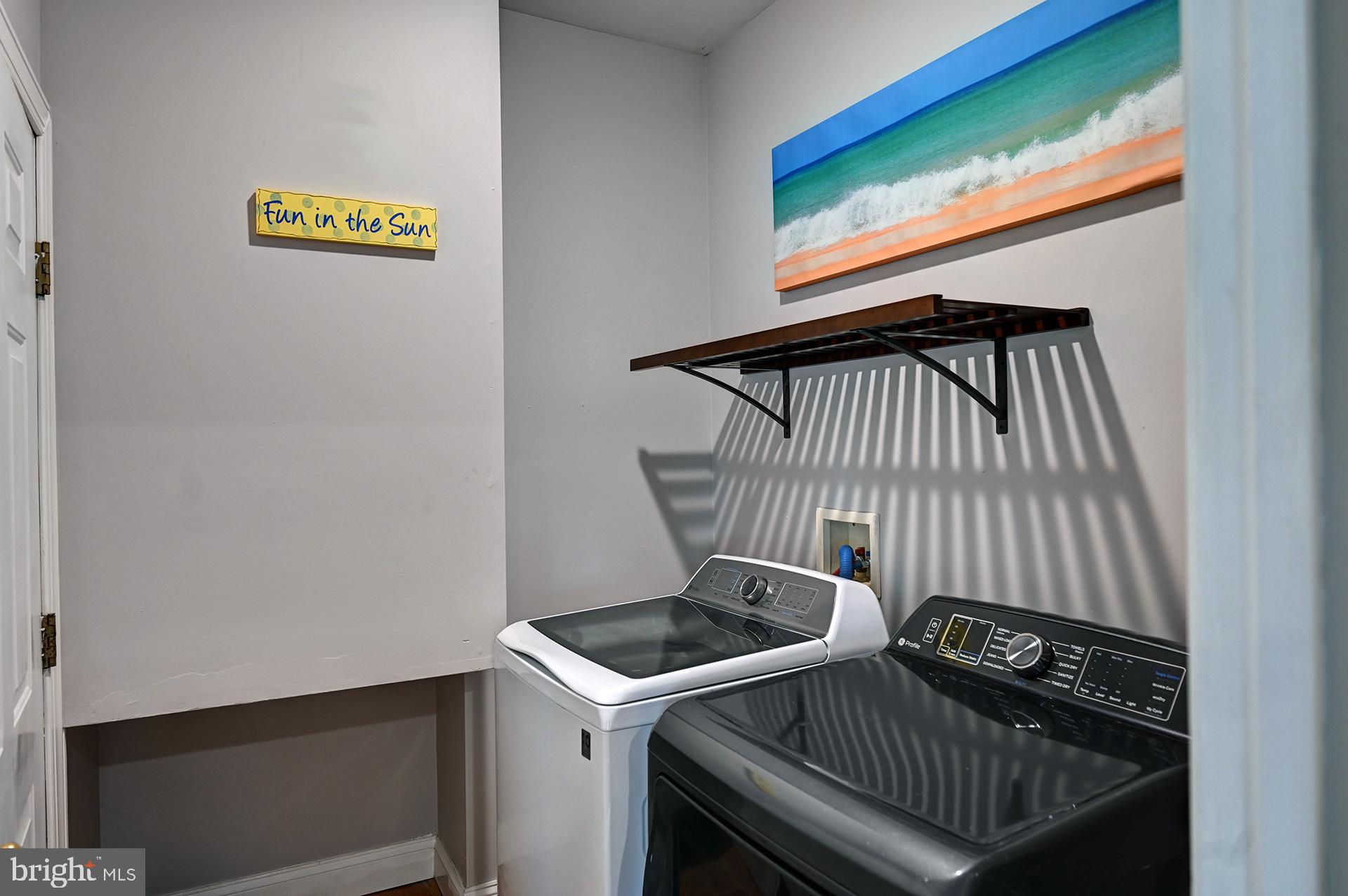 31765 Hickory Manor Road Frankford, DE 19945 - Photo 34 of 53 a view of a sink and a washer and dryer