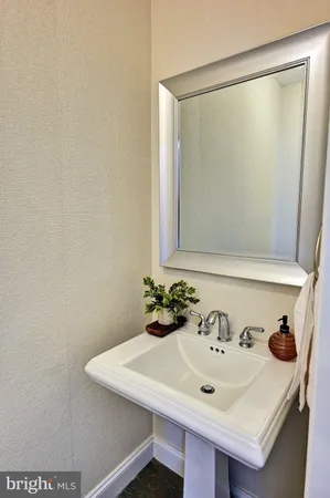 a view of living room with furniture and a window