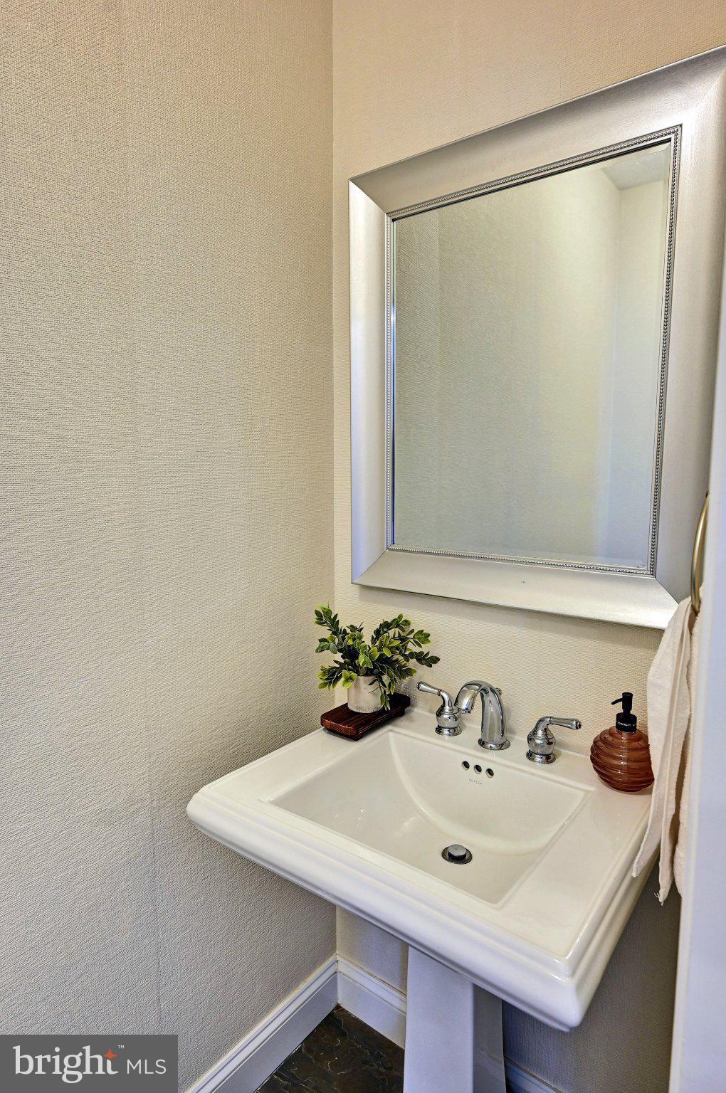 31765 Hickory Manor Road Frankford, DE 19945 - Photo 35 of 53 a bathroom with a sink and a mirror
