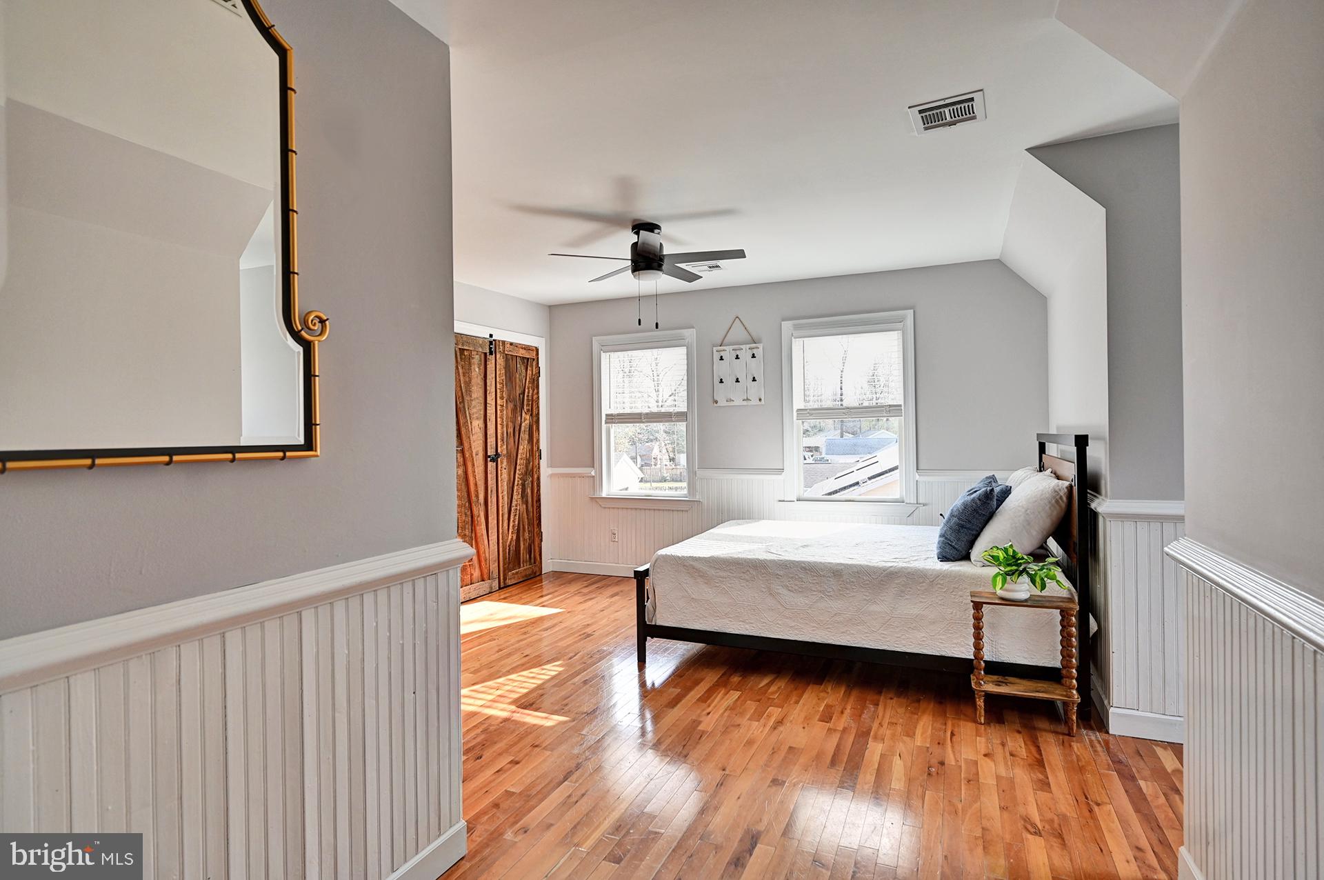 31765 Hickory Manor Road Frankford, DE 19945 - Photo 39 of 53 a living room with furniture and wooden floor