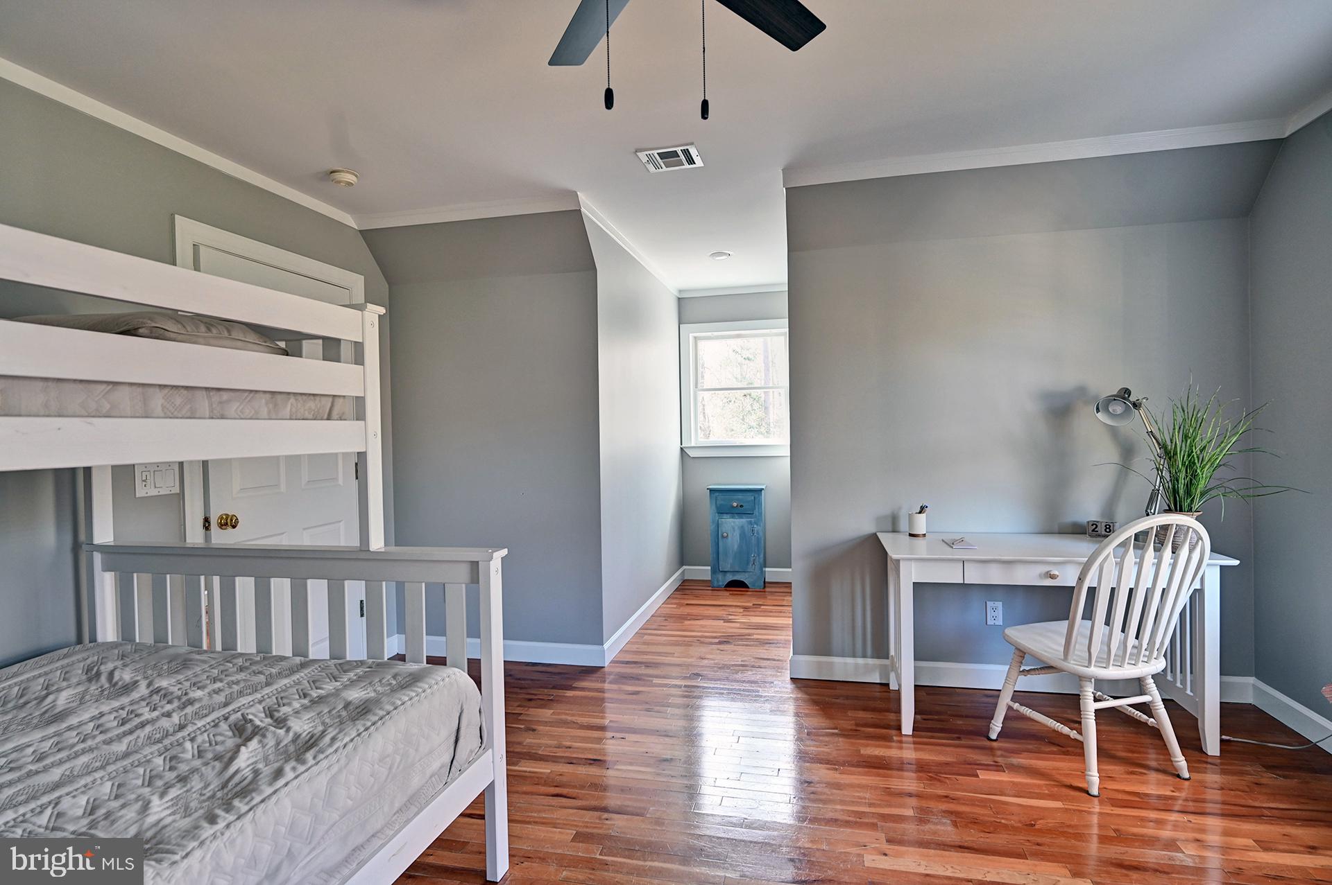 31765 Hickory Manor Road Frankford, DE 19945 - Photo 44 of 53 a view of a dining room with furniture and wooden floor