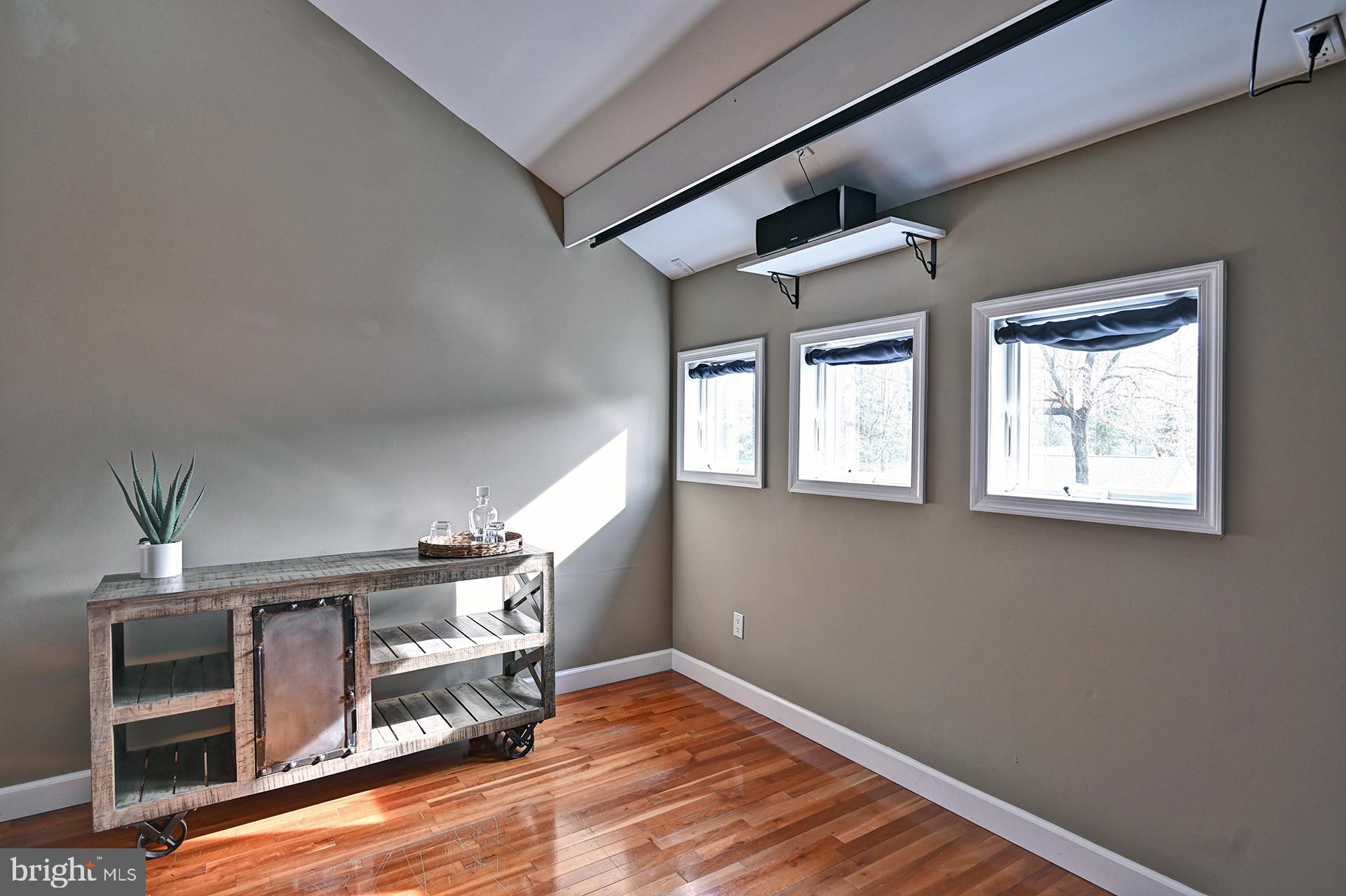 31765 Hickory Manor Road Frankford, DE 19945 - Photo 52 of 53 a view of an empty room with wooden floor and a window