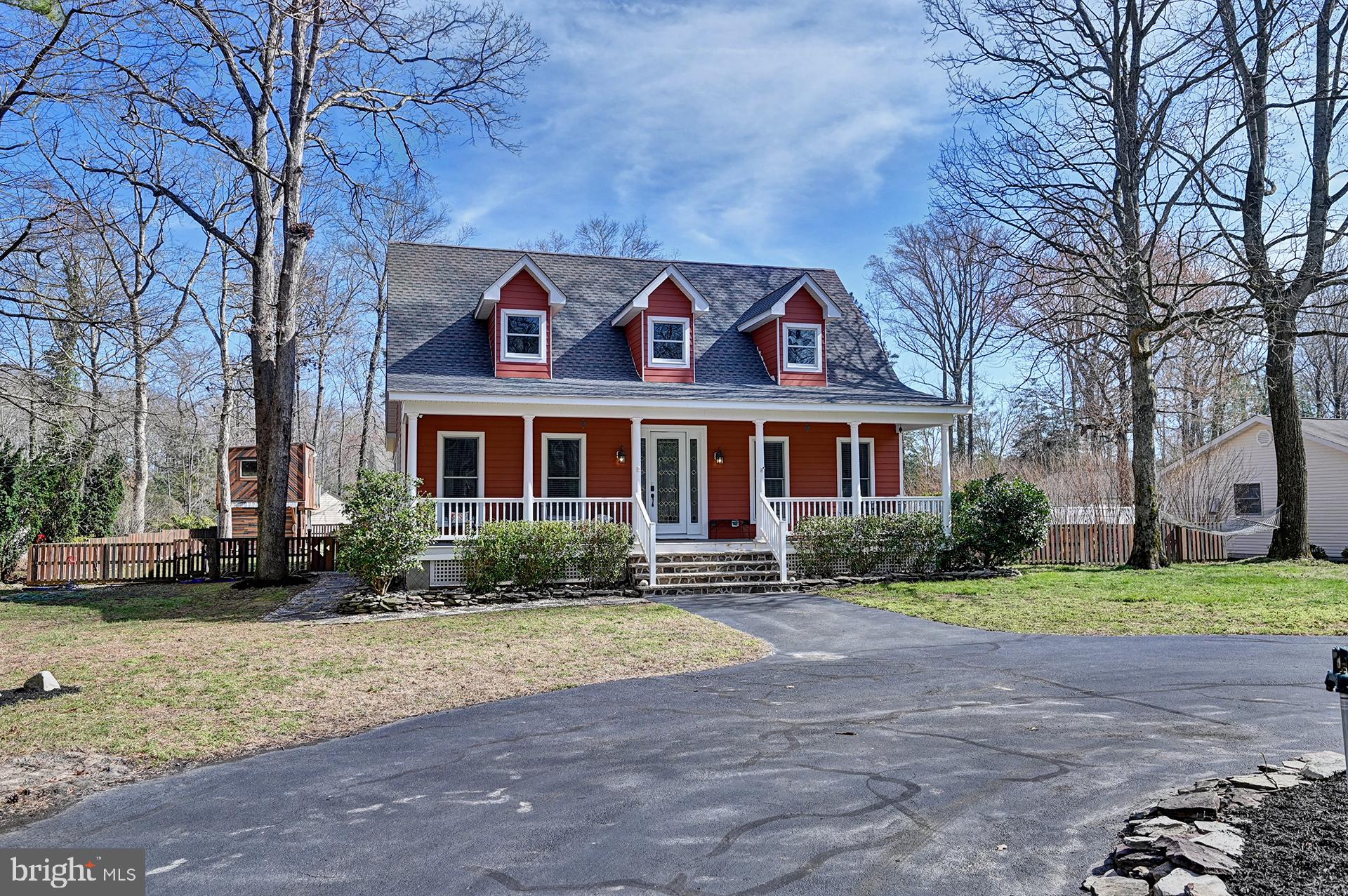 31765 Hickory Manor Road Frankford, DE 19945 - Photo 6 of 53 a front view of house with yard and green space