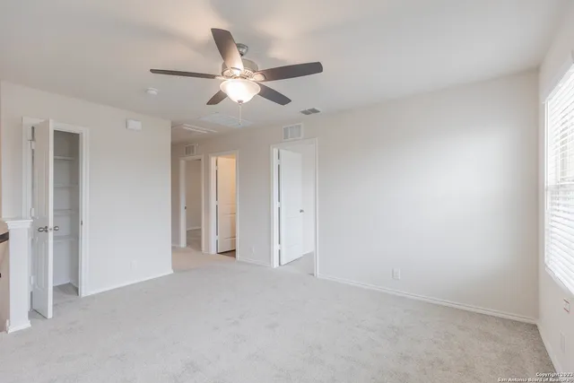 a view of an empty room and window