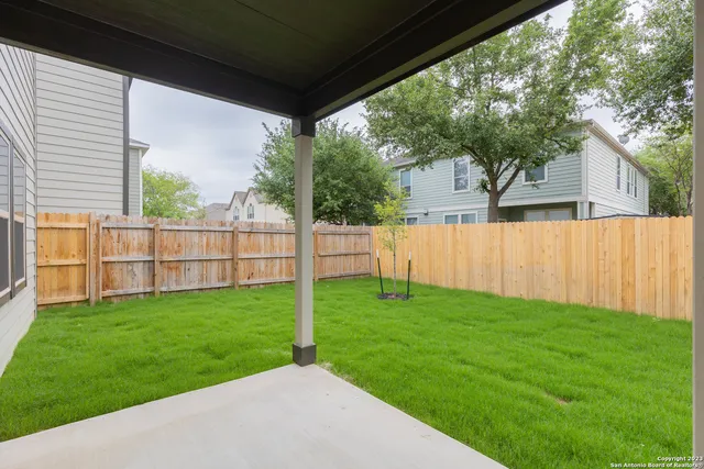 a view of a backyard with a garden