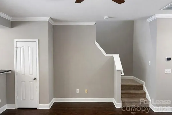a view of entryway with wooden floor