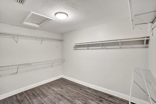 a bathroom with a bathtub a mirror a sinks and a shower