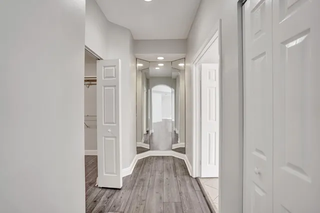 a view of a room with racks on the wall