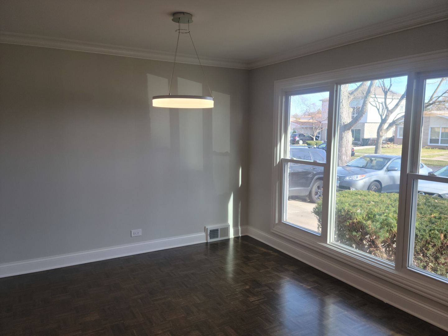 908 Long Road Glenview, IL 60025 - Photo 7 of 15 an empty room with wooden floor and windows