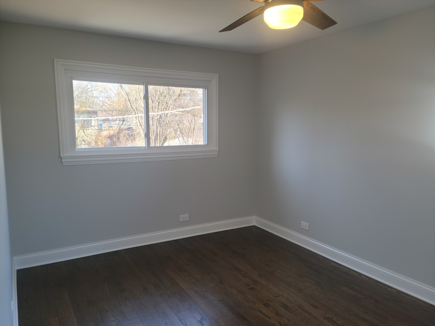 908 Long Road Glenview, IL 60025 - Photo 10 of 15 an empty room with wooden floor and windows