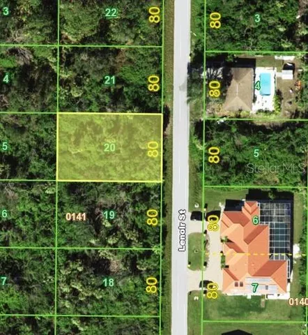 a front view of building with yard