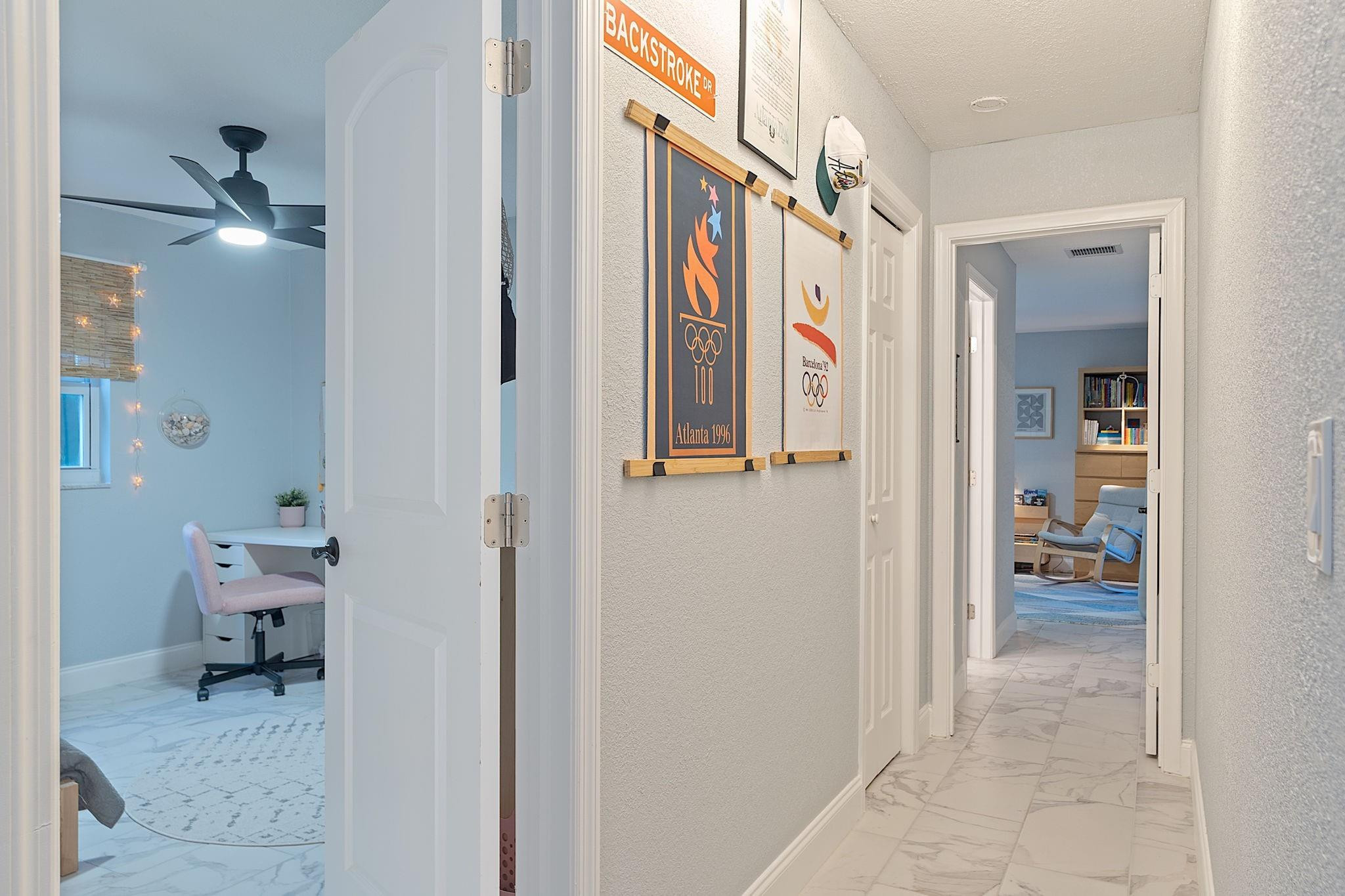22848 Southwest 54th Way Boca Raton, FL 33433 - Photo 25 of 44 a view of a hallway with wooden shelves