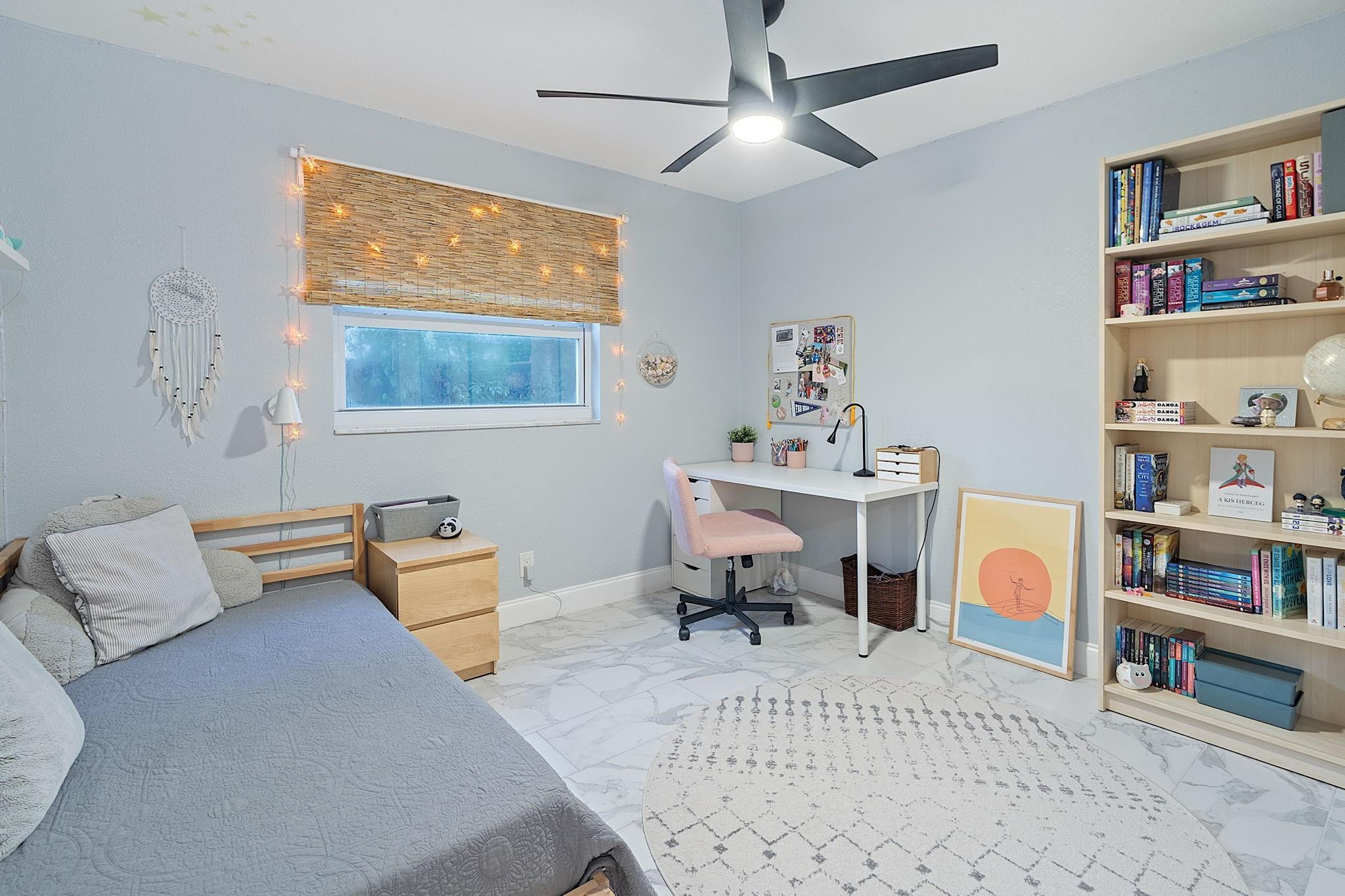 22848 Southwest 54th Way Boca Raton, FL 33433 - Photo 27 of 44 a bedroom with furniture and a bed