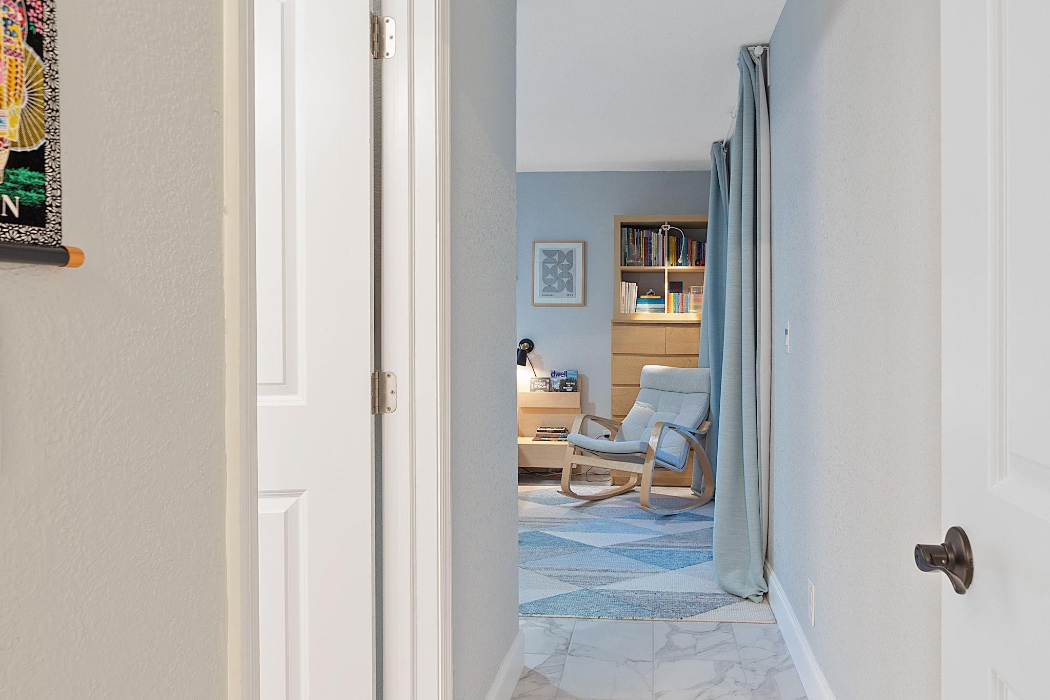 22848 Southwest 54th Way Boca Raton, FL 33433 - Photo 28 of 44 a view of a bedroom from a hallway
