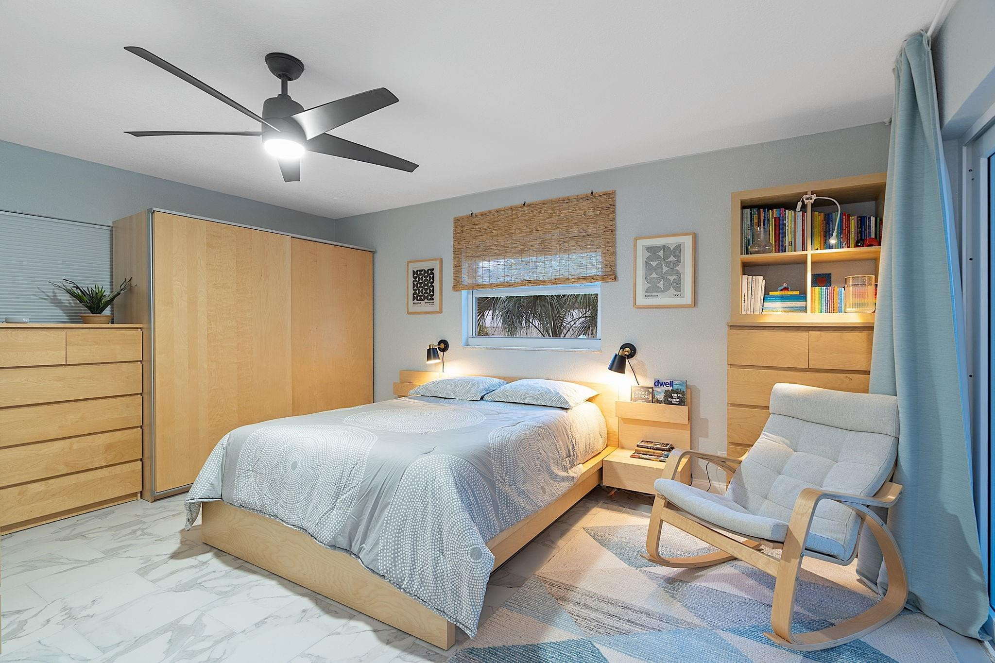 22848 Southwest 54th Way Boca Raton, FL 33433 - Photo 29 of 44 a bedroom with a bed and wooden floor