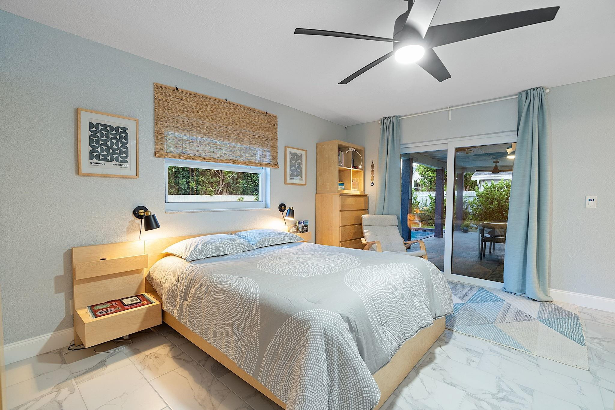 22848 Southwest 54th Way Boca Raton, FL 33433 - Photo 32 of 44 a bedroom with a bed and a large mirror