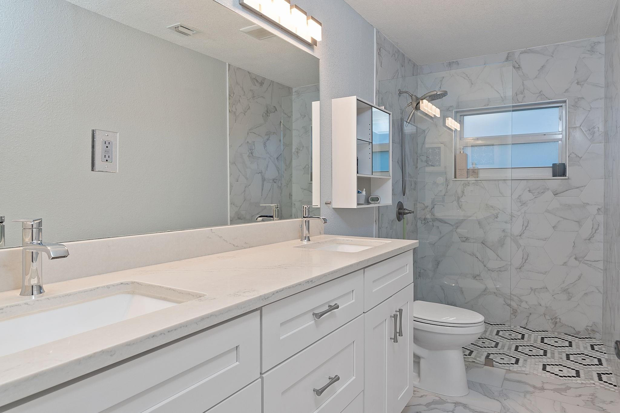22848 Southwest 54th Way Boca Raton, FL 33433 - Photo 33 of 44 a bathroom with a sink toilet and shower