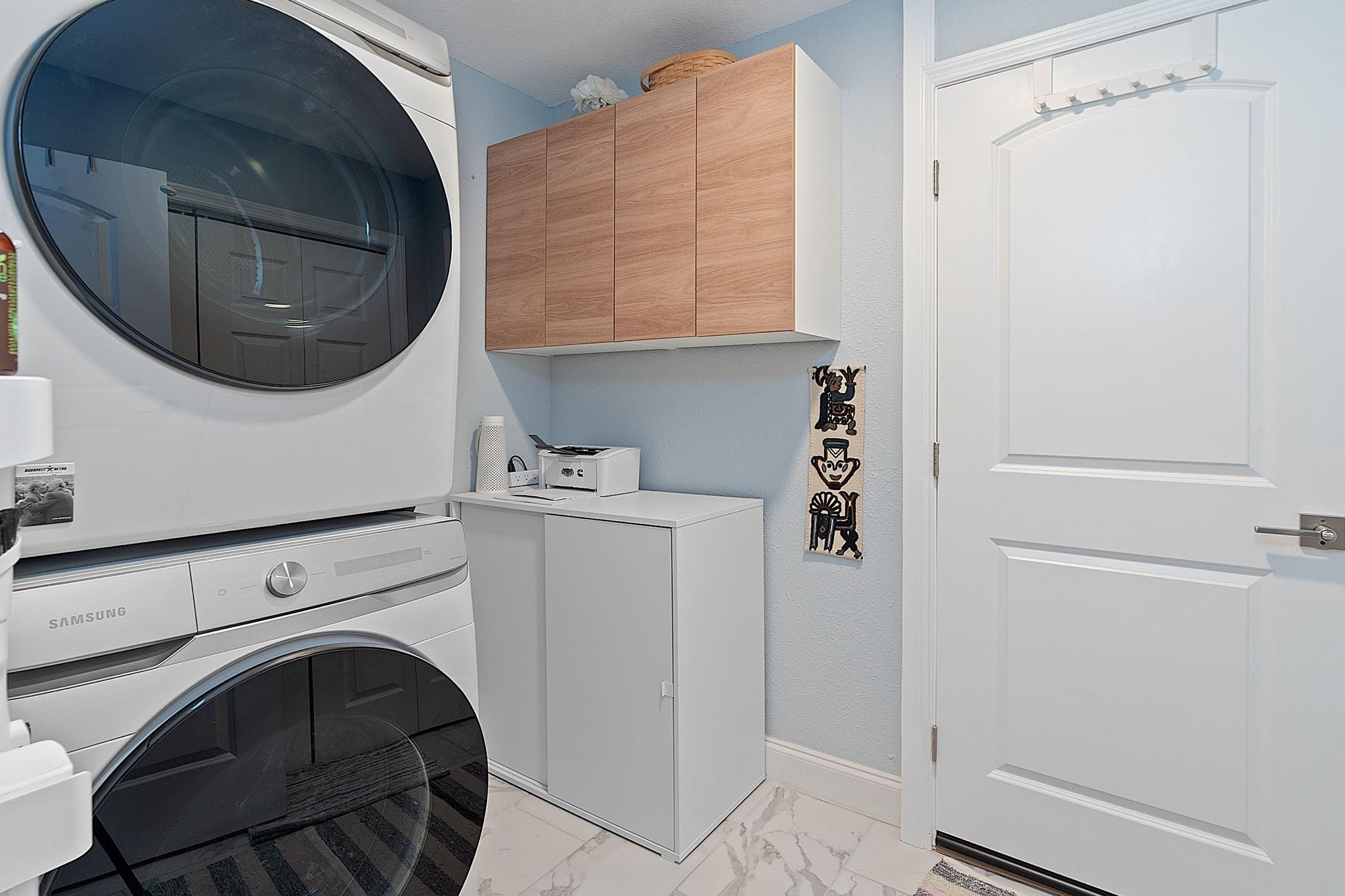 22848 Southwest 54th Way Boca Raton, FL 33433 - Photo 35 of 44 a utility room with dryer and washer