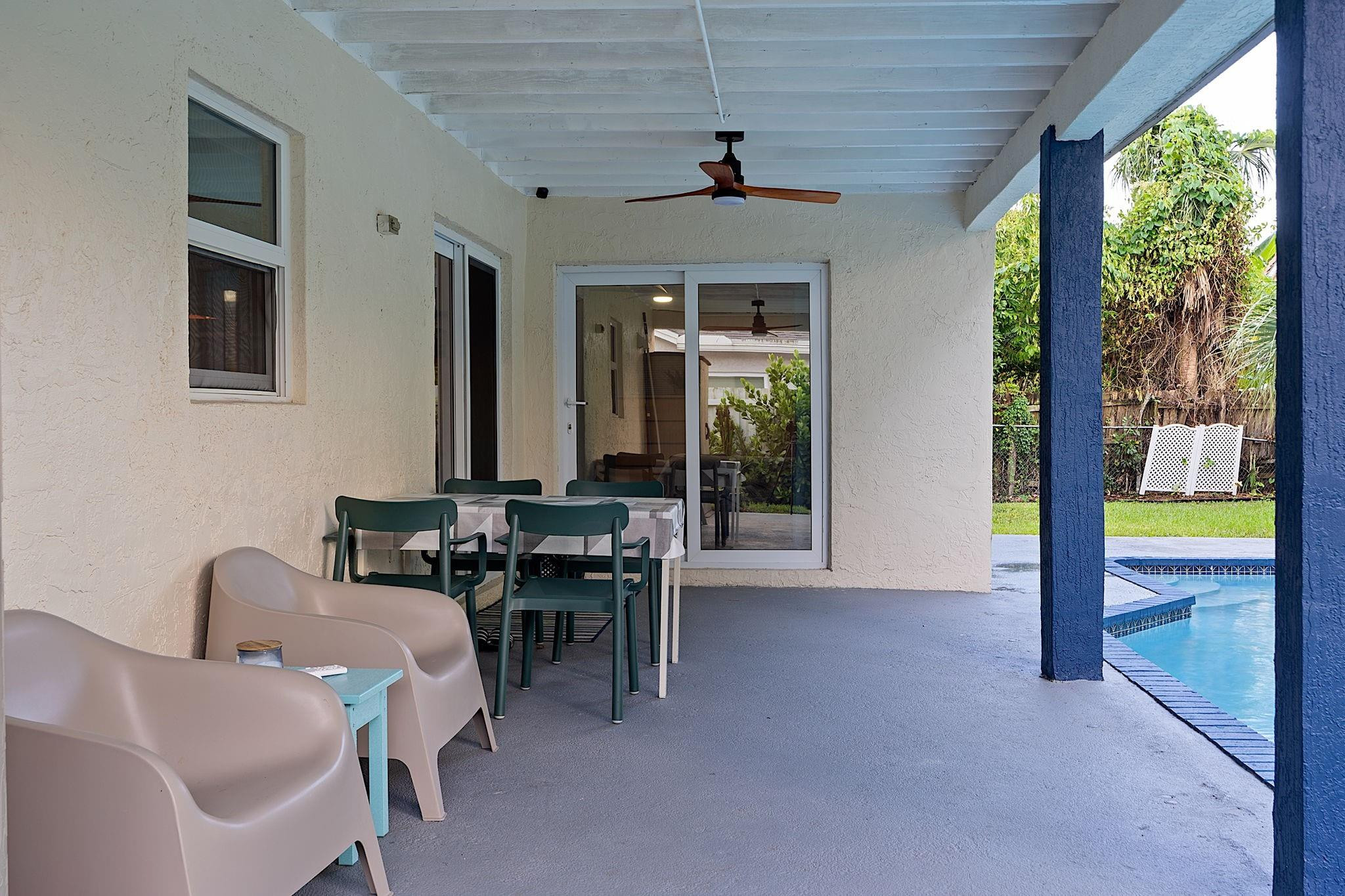 22848 Southwest 54th Way Boca Raton, FL 33433 - Photo 36 of 44 a view of a dining room with furniture window and outside view