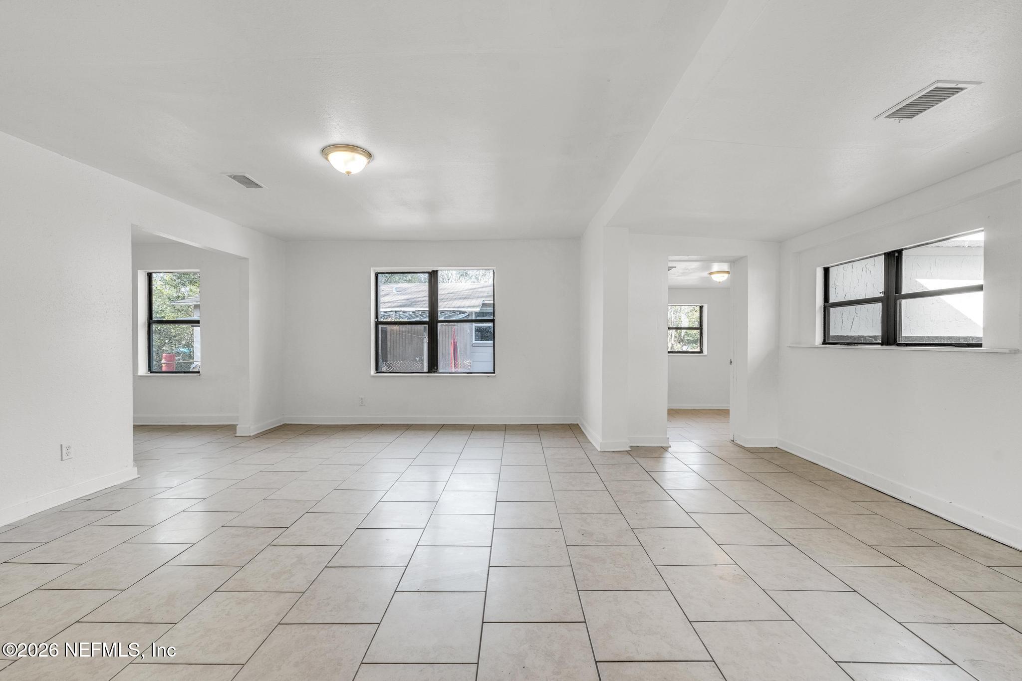 1830 West 27th Street Jacksonville, FL 32209 - Photo 19 of 21 a view of a livingroom with a window