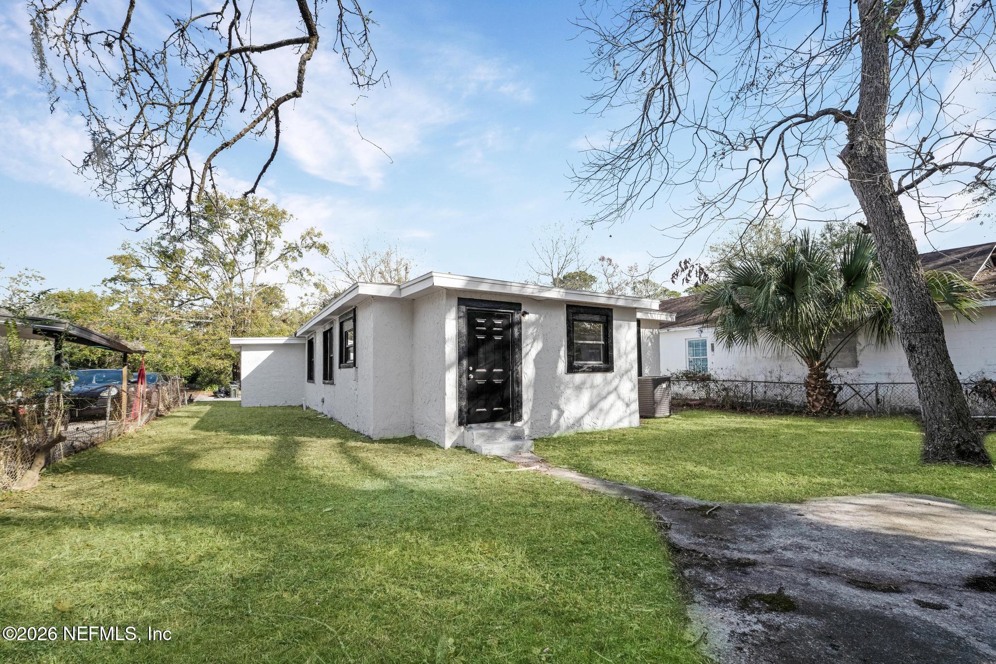 1830 West 27th Street Jacksonville, FL 32209 - Photo 21 of 21 a view of a house with a yard and tree s