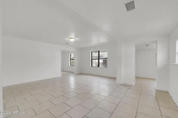 an empty room with windows