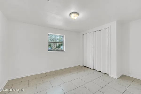 an empty room with windows