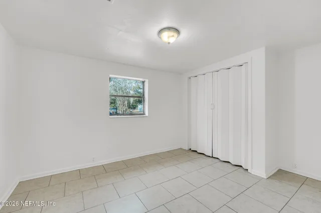 an empty room with windows