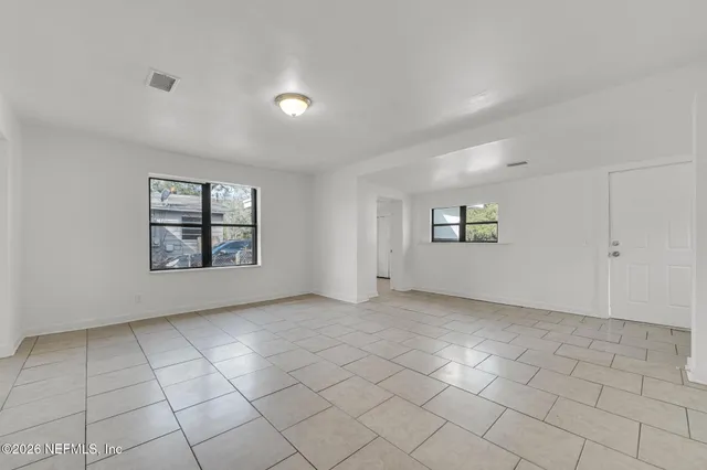 an empty room with windows