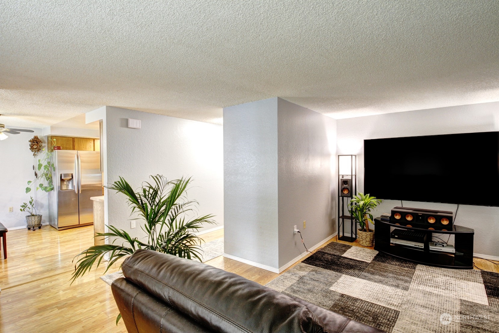 7710 Lower Ridge Road Everett, WA 98203 - Photo 3 of 19 a living room with furniture and a flat screen tv