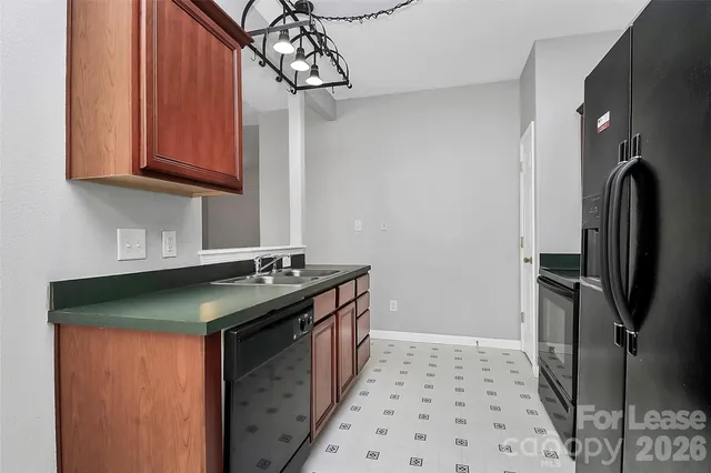 a view of a bedroom with bed and hallway