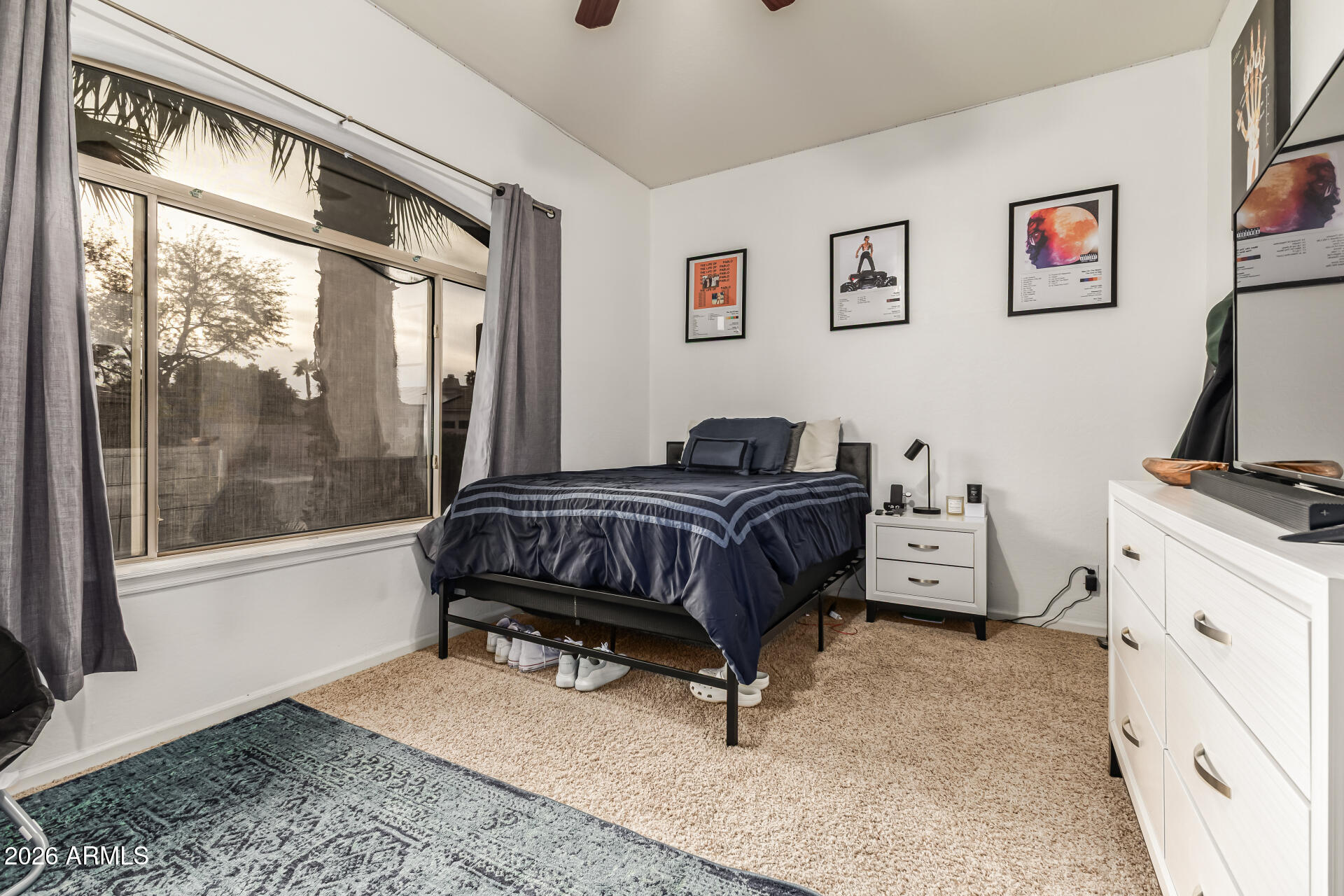 13318 West Coronado Road Goodyear, AZ 85395 - Photo 30 of 48 a bedroom with a bed and a window