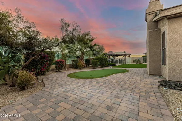 a view of a garden with a pathway
