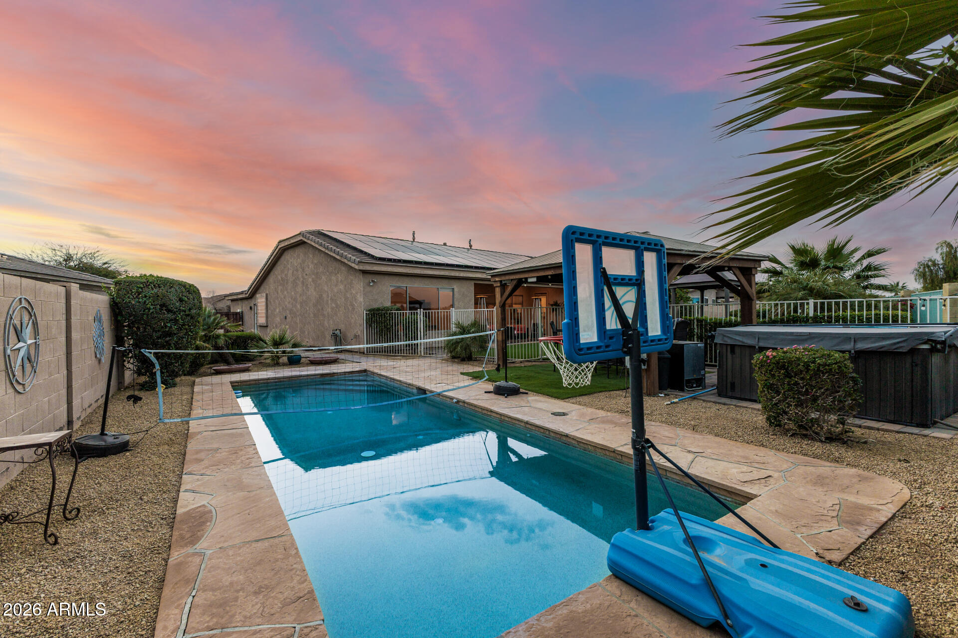 13318 West Coronado Road Goodyear, AZ 85395 - Photo 40 of 48 a view of house with yard and sitting area