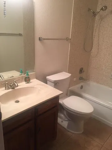 a view of empty room with closet