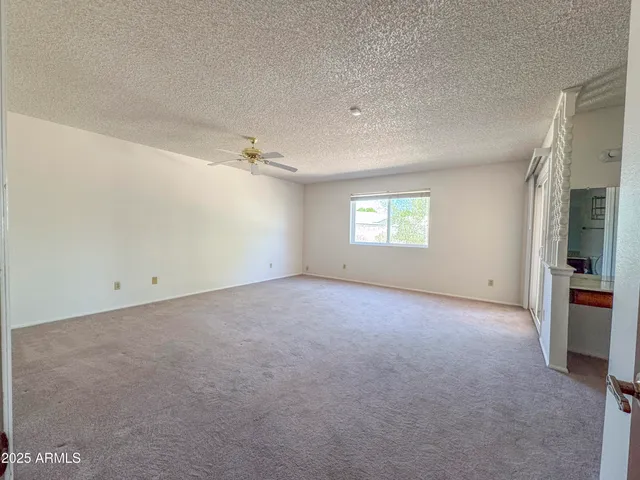 a view of a room with rack on the wall