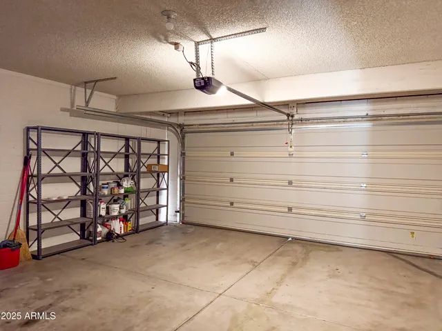 a view of a house with a snow in the background