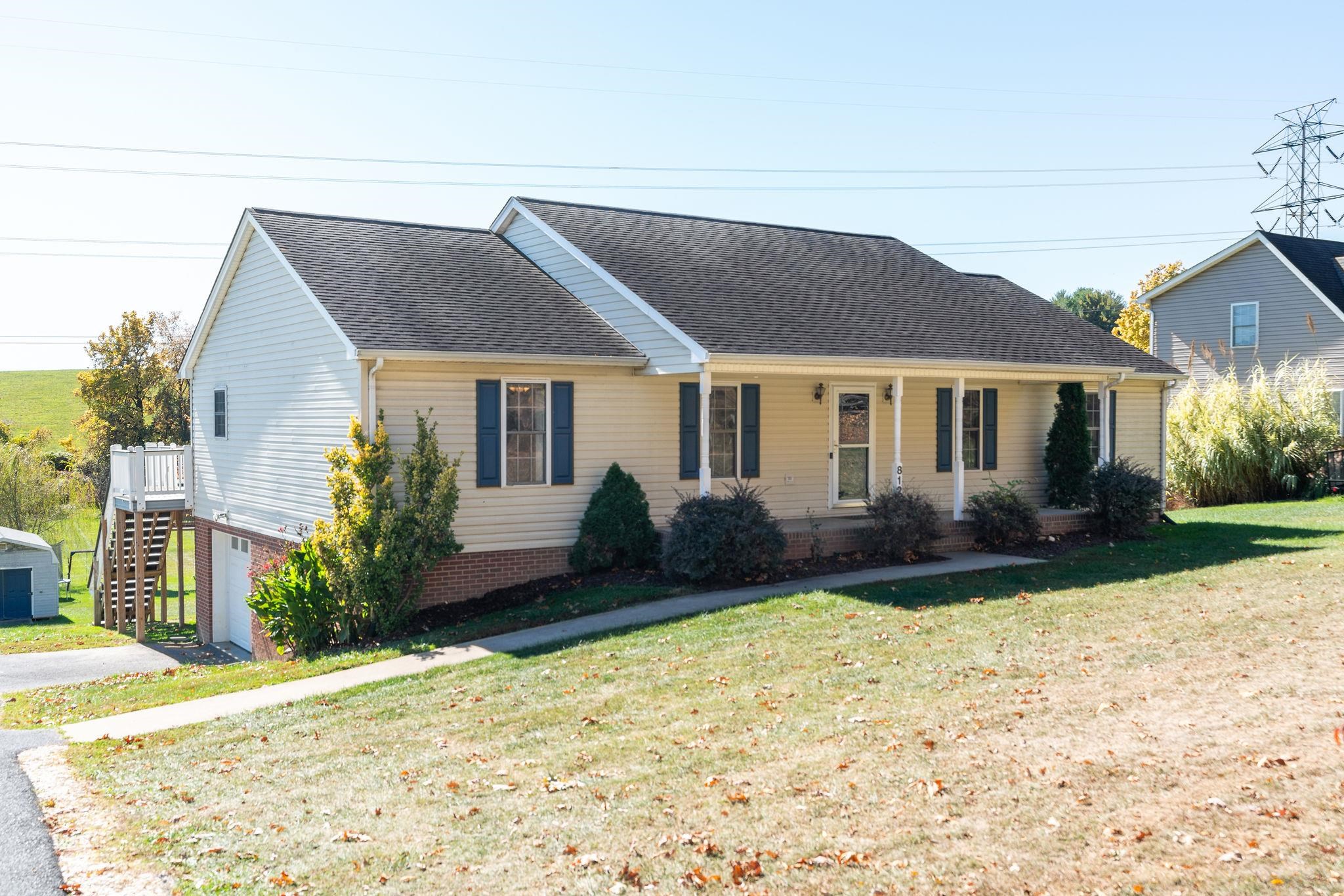 812 New Hope Road Staunton, VA 24401 - Photo 3 of 67 a front view of a house with garden