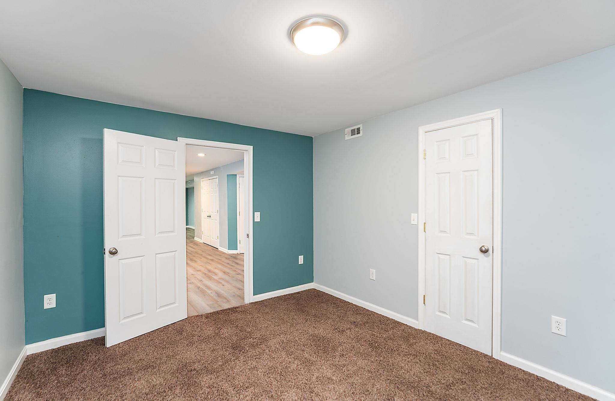 812 New Hope Road Staunton, VA 24401 - Photo 49 of 67 an empty room with closet and mirror