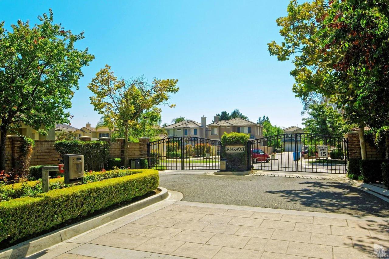 1854 Locust Street Simi Valley, CA 93063 - Photo 1 of 17 a view of a park with swings and slides