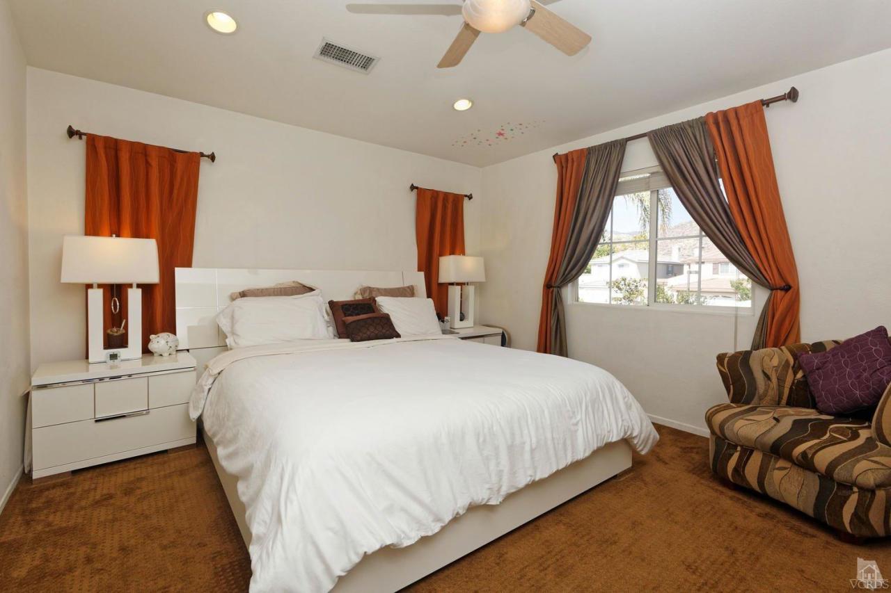 1854 Locust Street Simi Valley, CA 93063 - Photo 11 of 17 a bedroom with bed and window