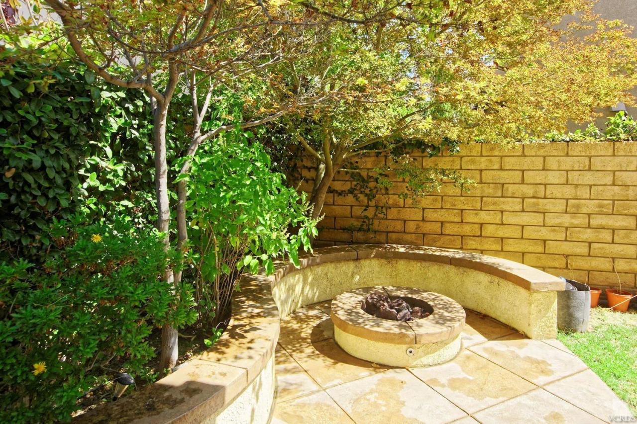 1854 Locust Street Simi Valley, CA 93063 - Photo 5 of 17 a view of a swimming pool and lounge chair