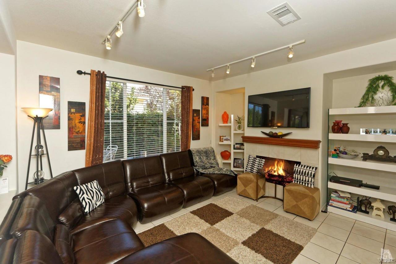 1854 Locust Street Simi Valley, CA 93063 - Photo 6 of 17 a living room with furniture and a flat screen tv
