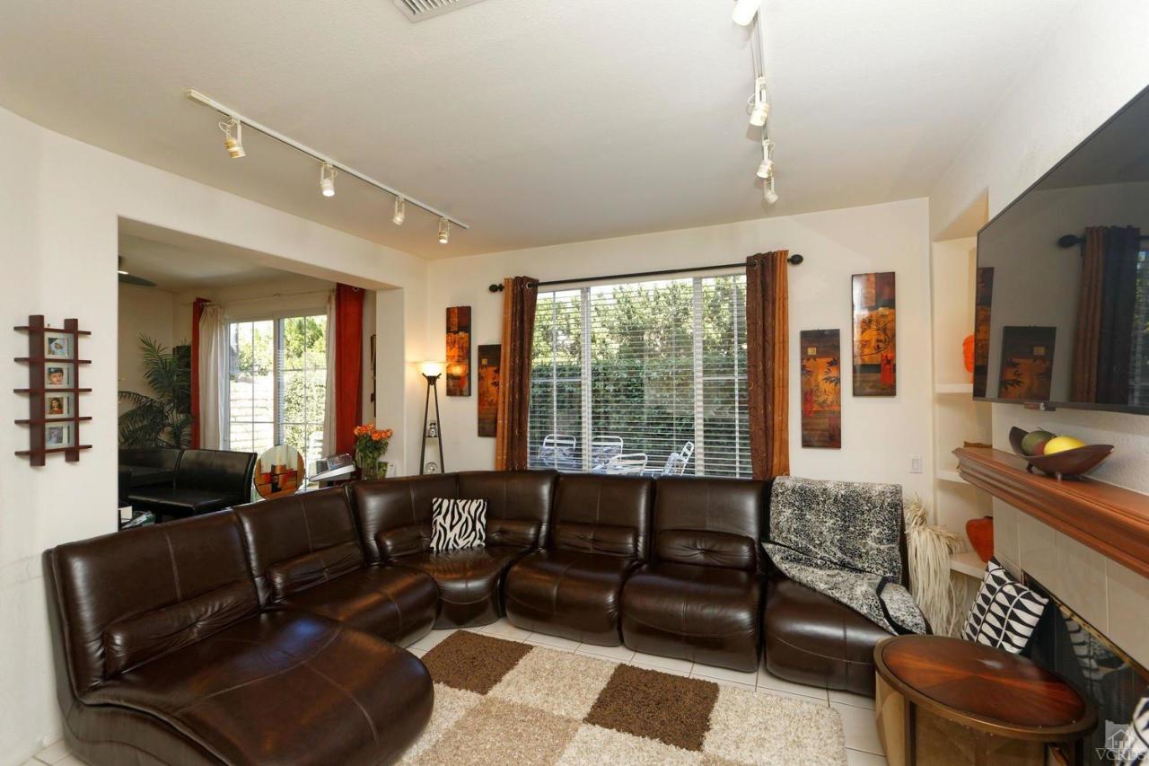 1854 Locust Street Simi Valley, CA 93063 - Photo 8 of 17 a living room with furniture and a large window