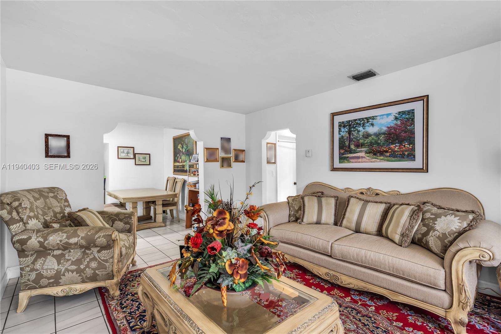 2145 Southwest 26th Street Miami, FL 33133 - Photo 5 of 26 a living room with furniture and a couch